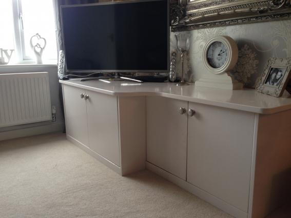 Bespoke television and storage cabinet. Handles from Laura Ashley.