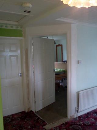 Hallway now opened up with new entrance to bedroom